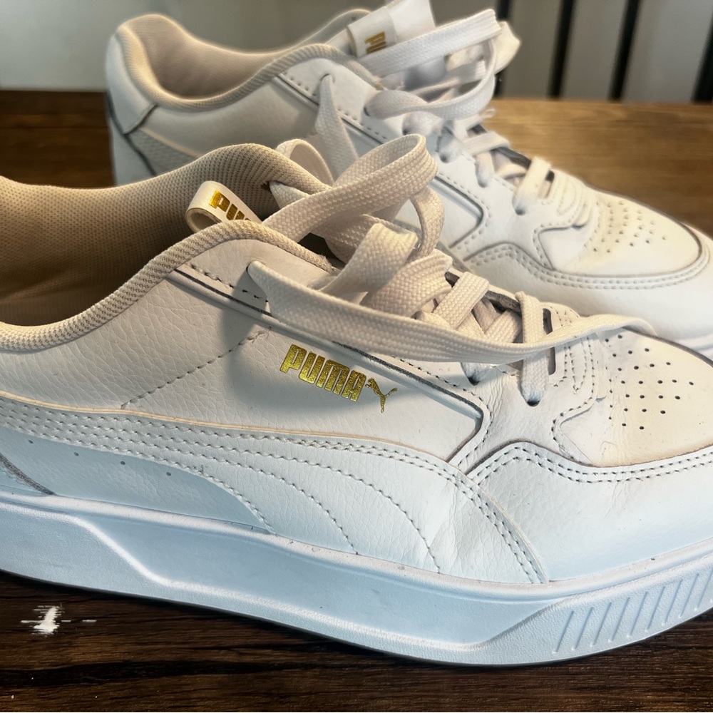 All white platform pumas